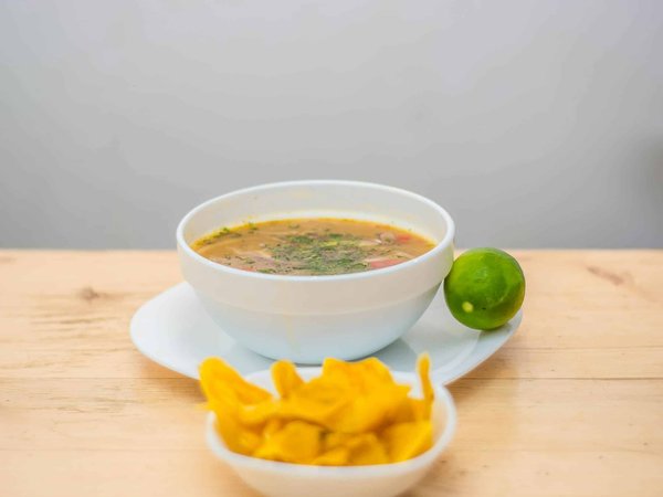 What Techniques Ensure a Flavorful African Peanut Stew with Sweet Potatoes?